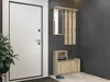 An entryway with a white door, a plant, and a wooden furniture set with a mirror and coat hooks. Anteprima dell’immagine prodotto