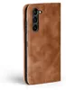 A brown leather flip case for a Samsung Galaxy S23 phone, showing the camera cutout. Produktbild-Vorschau
