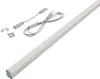 A white LED under-cabinet light bar with its accessories, including cables and mounting brackets, laid out on a white background. Produktbild-Vorschau