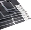A stack of black heating pads with labels indicating different wattages. Anteprima dell’immagine prodotto