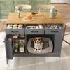 A kitchen island with storage, drawers, and a built-in dog bed, featuring a dog resting in the bed. The kitchen island is in a modern kitchen setting with green cabinets in the background. Anteprima dell’immagine prodotto
