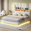 A modern bedroom with a white bed featuring LED lighting and a headboard with storage. Anteprima dell’immagine prodotto