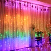 A room decorated with a rainbow LED curtain light, with shelves and furniture in the background. Produktbild-Vorschau