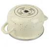The bottom of a speckled beige pot is shown against a white background. Produktbild-Vorschau