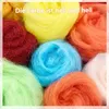 A close-up of colorful balls of wool roving. Produktbild-Vorschau