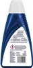 The back of a blue plastic bottle of cleaning solution with a white cap. Voir les images du produit