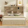 A kingsize platform bed with a bookshelf headboard and drawers, set in a bedroom. Produktbild-Vorschau