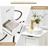 A collage showing a white bathroom cabinet with drawers open and a decorative arrangement on top. Náhled obrázku produktu