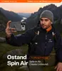 A man taking a selfie with a phone case in a mountainous landscape. Produktbild-Vorschau