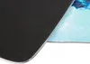 Close-up view of the underside and edge of a mousepad with a printed design. Náhľad obrázku produktu