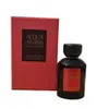 A perfume bottle and its box are displayed against a white background. Voir les images du produit