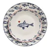 Two plates, one stacked on top of the other, both decorated with a pattern of blue fish and red hearts. Náhled obrázku produktu