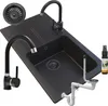 A black granite sink with two faucets, a drain assembly, and a spray bottle. Náhľad obrázku produktu