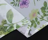 A close-up view of a floral patterned fabric, likely a curtain or blind, folded to show the texture and stitching. Produktbild-Vorschau