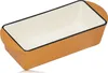 A close-up, angled view of an empty orange loaf pan with a white interior and a black rim, set against a white background. Náhľad obrázku produktu