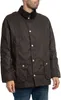 A man wearing a brown wax jacket. Produktbild-Vorschau