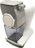 A white electric grater with gray and dark gray components sits on a white background. Anteprima dell’immagine prodotto