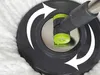 A close-up view of the top of a spin mop head and its mechanism, with white arrows indicating rotation. Náhled obrázku produktu