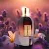 A perfume bottle is displayed in a field of lavender and white flowers with a soft, blurred background. Produktbild-Vorschau