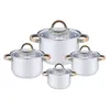A set of four stainless steel pots with glass lids and gold-colored handles, arranged on a white background. Náhľad obrázku produktu