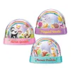 Three glitter globes with different animal themes and rainbow arches, each on a colored base with text. Produktbild-Vorschau