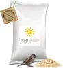 A bag of sunflower seeds with a bird and a pile of seeds in the foreground. Produktbild-Vorschau
