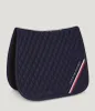 A navy blue quilted saddle pad with a Tommy Hilfiger logo and stripe detail. Produktbild-Vorschau