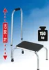 A step stool with a handle against a blue sky background. Podgląd zdjęcia produktu