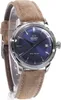 A close-up, studio shot of a wristwatch with a blue dial and a brown leather strap. Voir les images du produit