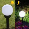 A split image showing a solar garden light during the day and at night. Produktbild-Vorschau