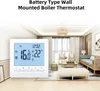 A digital thermostat is displayed in a modern living room setting. Podgląd zdjęcia produktu