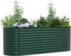 A green raised garden bed filled with plants. Produktbild-Vorschau