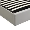 A close-up view of the corner of a bed frame, showing the upholstered side and the wooden slats of the mattress support. Náhled obrázku produktu