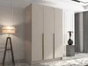 A modern wardrobe with gold handles in a well-lit room. Produktbild-Vorschau