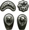 Four metal cookie cutters are arranged in a grid on a white background. Voir les images du produit