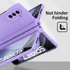 A close-up, angled view of a purple phone case for a foldable phone, shown in a partially open state. Produktbild-Vorschau