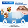 A hand holding a zip-lock bag with various items like cookies, jelly beans, and nuts shown in other bags. Produktbild-Vorschau