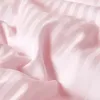 Close-up of pink striped fabric. Náhled obrázku produktu