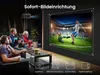 A group of people are watching a soccer game projected onto a wall by a projector. The projector is mounted on the ceiling. Náhled obrázku produktu