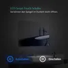 A modern bathroom with a lit mirror and sink. Voir les images du produit