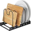 A black metal rack holding two wooden cutting boards and three white plates. Anteprima dell’immagine prodotto