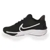A side view of a black Nike Star Runner 4 sneaker with a white swoosh logo, set against a white background. Voir les images du produit