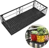 A black metal balcony planter shelf is shown against a white background, with a smaller inset image showing the shelf holding colorful flower pots with plants on a railing. Náhled obrázku produktu