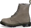 A side view of a grey Dr. Martens boot with fur lining. Produktbild-Vorschau
