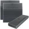 Three folded foam seat cushions are stacked and arranged diagonally on a white background. Produktbild-Vorschau