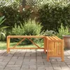 A wooden corner bench with a planter is placed on a paved patio in a garden setting. Produktbild-Vorschau