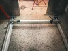 A construction site with a metal frame laid on the ground. Voir les images du produit