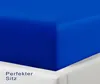 A close-up view of a royal blue fitted sheet on a white surface, likely a mattress or bed frame. Produktbild-Vorschau