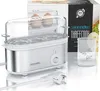 Product shot of an egg cooker with its packaging and accessories. Podgląd zdjęcia produktu
