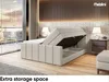 A bedroom scene with a bed featuring an open storage compartment. Produktbild-Vorschau